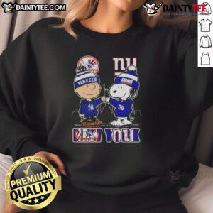 Awesome Snoopy X Charlie Brown sweatshirt featuring New York Yankees and Giants skyline design.