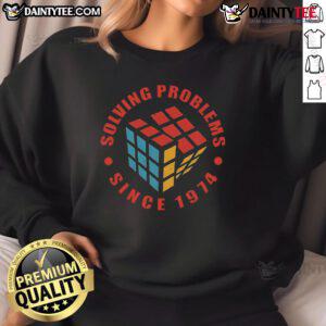 Retro sweatshirt featuring Awesome Solving Problems Since 1974 with a colorful Rubik's Cube design.
