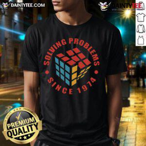 Awesome Solving Problems Since 1974 Rubik Cube Retro T-Shirt featuring a colorful Rubik's Cube design.