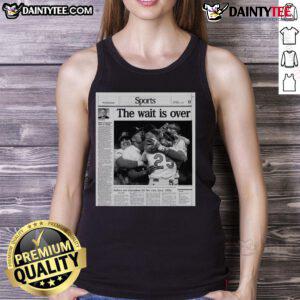 Indians celebrate their first championship win since 1954 in an 'Awesome Sports' tank top, showcasing team pride.