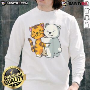 Adorable cartoon sweatshirt featuring a cute cat and bear hugging, showcasing animal friendship in a charming design.
