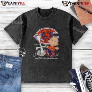 Alt Text: Cute Peanuts Snoopy and Charlie Brown Chicago Bears football washed t-shirt, perfect for fans and casual wear.