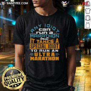 Funny 'Any Idiot Can Run A Marathon' T-Shirt design highlighting the humor of ultra marathons for dedicated runners.