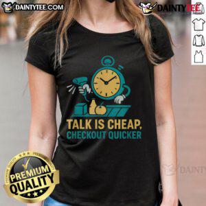 Funny cashier at grocery store with 'Talk Is Cheap, Checkout Quicker' tee, showcasing humor in retail work.