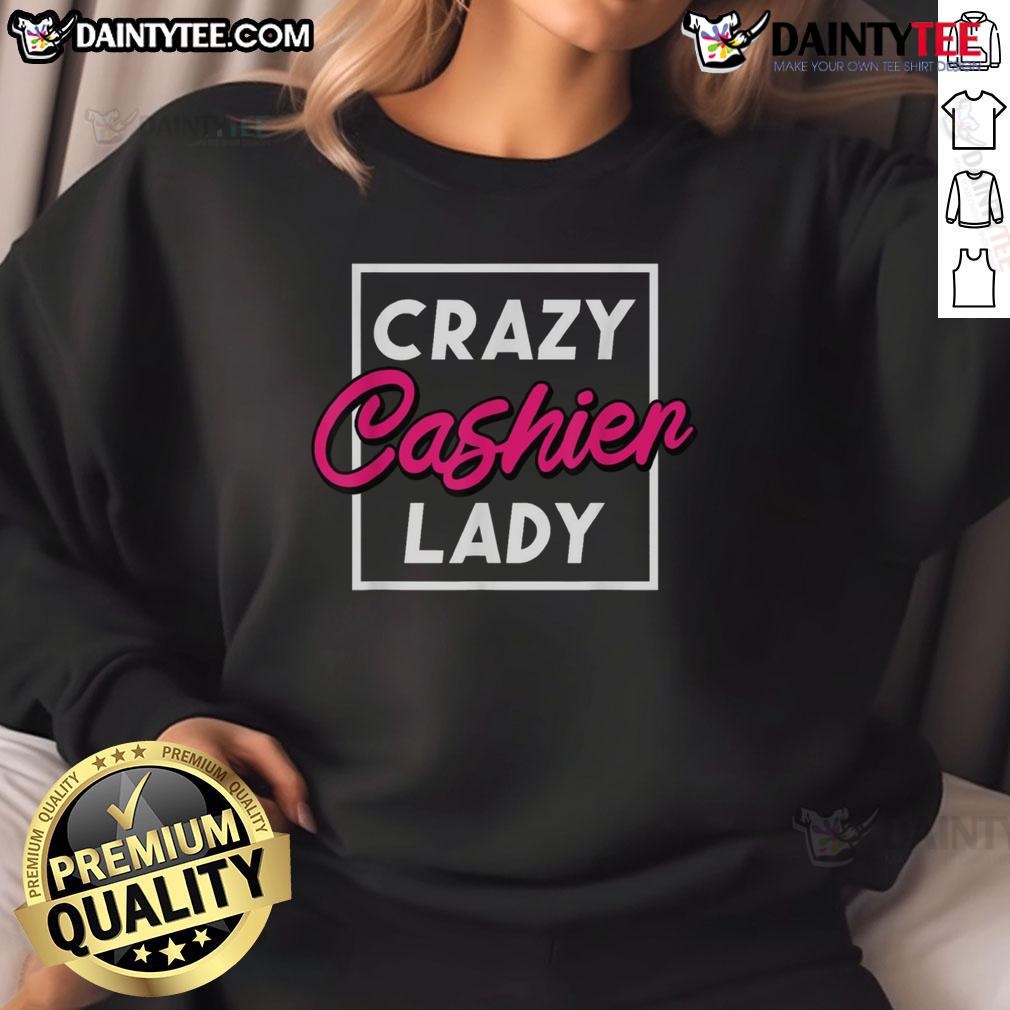 Funny crazy cashier lady in a grocery store wearing a humorous sweatshirt, showcasing retail worker spirit and personality.