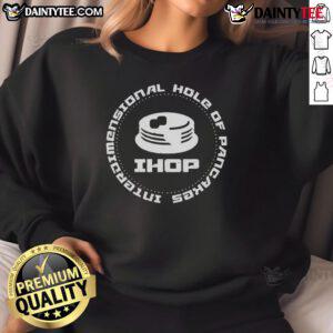 Funny interdimensional hole of pancakes sweatshirt featuring a whimsical design of floating pancakes in a vibrant scene.