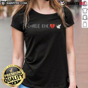 Happy Charlie Kirk wearing a broken heart dove ladies tee, showcasing a stylish and uplifting design.