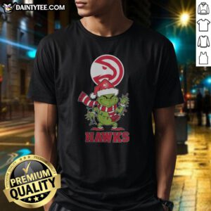 Awesome Atlanta Hawks Christmas Grinch Santa Hat Holiday 2025 T-Shirt featuring festive design and team colors.