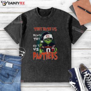 Alt Text: Awesome Grinch 'They Hate Us Because They Ain't Us' Carolina Panthers and Chicago Bears football washed t-shirt.