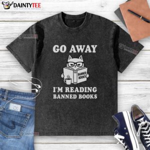 Cute cat wearing a Go Away, I'm Reading Banned Books washed t-shirt, perfect for book lovers and cat enthusiasts.