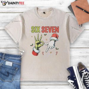 Funny Christmas meme on a washed t-shirt featuring the numbers 6 and 7, perfect for holiday humor and festive vibes.