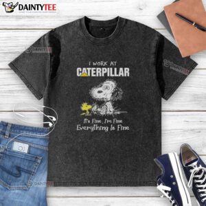 Funny Snoopy graphic on a washed t-shirt saying 'I work at Caterpillar, it's fine, I'm fine, everything is fine'.