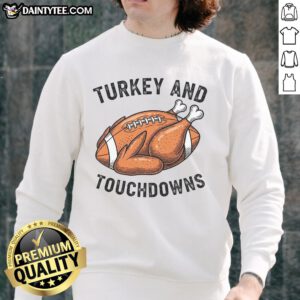 Alt Text: Funny turkey and touchdowns design on a Thanksgiving football fan sweatshirt, perfect for holiday celebrations.