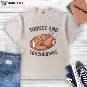 Alt Text: Funny turkey and touchdowns Thanksgiving football fan washed t-shirt perfect for holiday celebrations and game day.