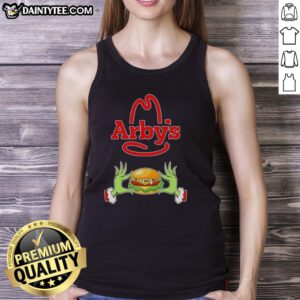 Good Grinch hands holding an Arby's cup, wearing a Merry Christmas tank top, perfect for holiday festivities.