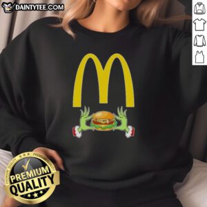 Good Grinch Hands Love McDonald's Merry Christmas Sweatshirt featuring festive design and cozy style for the holidays.