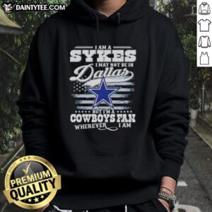 Cowboys fan wearing a 'Good-I-Am-A-Sykes' hoodie, showing team pride outside Dallas.