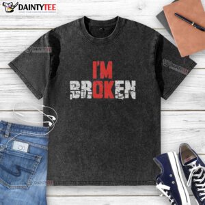 Emotional quote graphic on a washed t-shirt, featuring 'Good, I'm Broken' in stylish typography.
