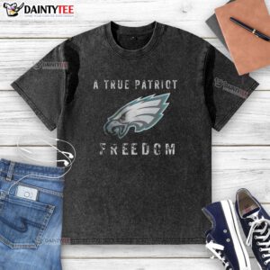 Alt Text: Good Philadelphia Eagles Football A True Patriot Freedom Washed T-Shirt displayed on a wooden background.