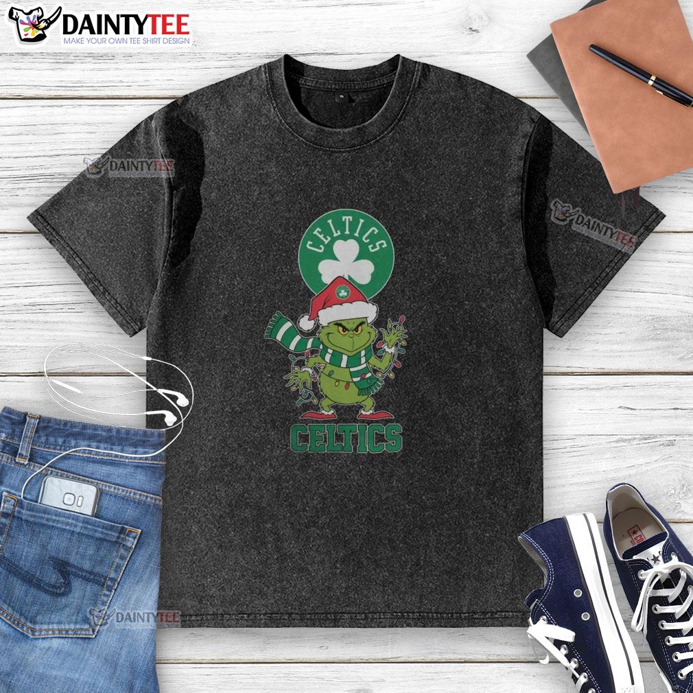 Happy Boston Celtics Christmas t-shirt featuring Grinch in Santa hat, perfect for holiday cheer in 2025.