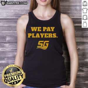 Alt Text: Happy Chad Powers wearing a We Pay Players tank top, showcasing Coach Byrd's vibrant coaching spirit and team pride.