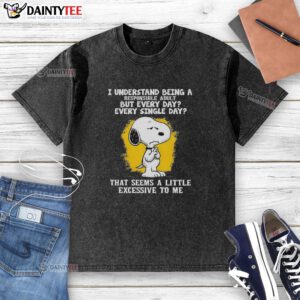 Happy Snoopy wearing a washed T-shirt, expressing the struggle of being a responsible adult every single day.