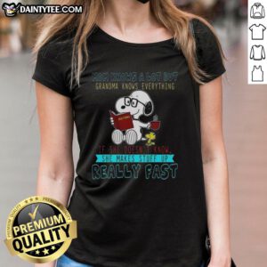 Happy Snoopy mom tee with 'Mom knows a lot but grandma knows everything' slogan, perfect for casual women's wear.