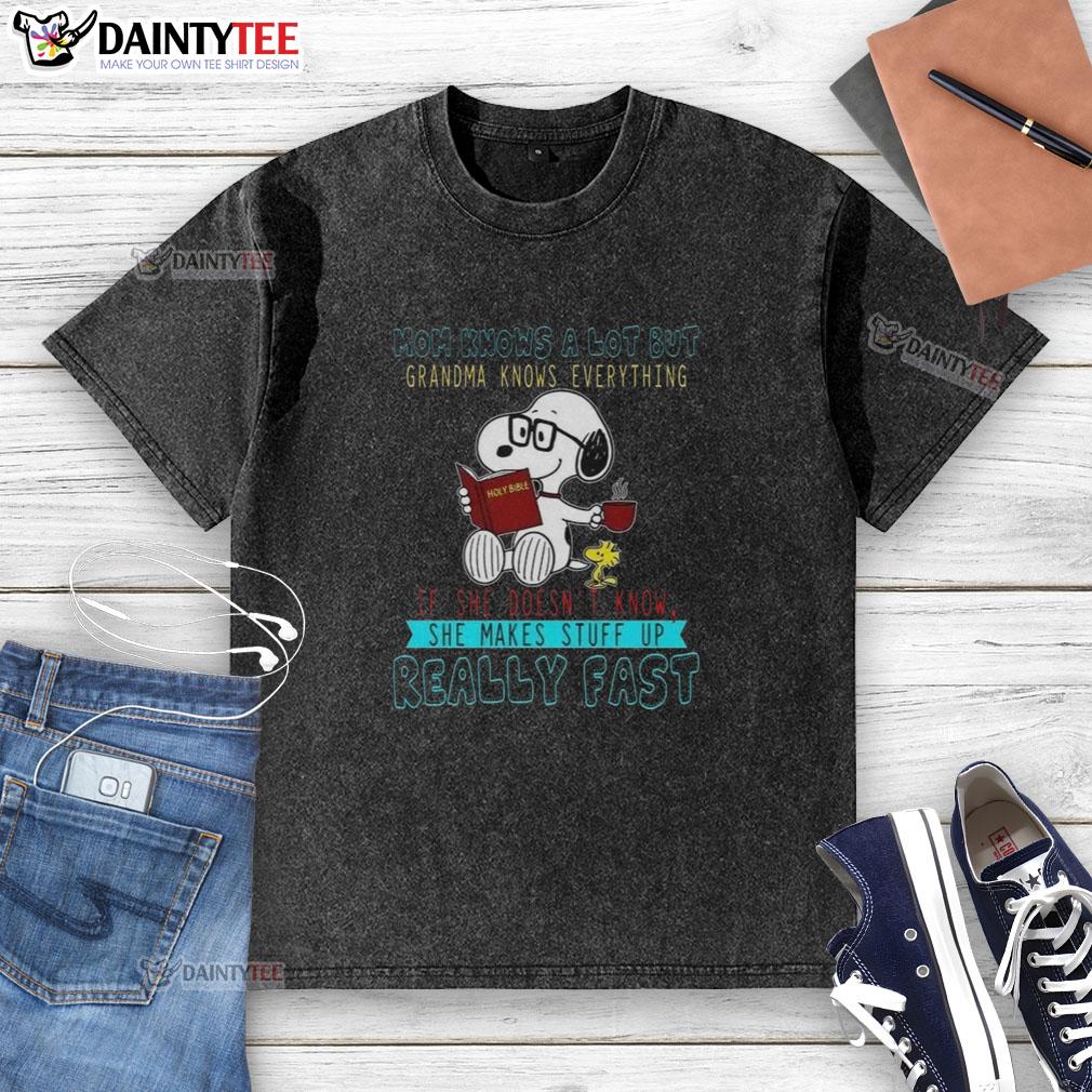 Happy Snoopy mom knows a lot but grandma knows everything graphic on a washed t-shirt, perfect for family bonding.