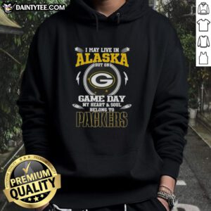 Premium hoodie featuring 'I May Live In Alaska But On Game Day My Heart And Soul Belongs To Green Bay Packers' design.
