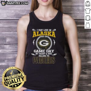 Premium tank top featuring 'I May Live In Alaska, But My Heart Belongs To Green Bay Packers' design for fans.