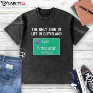 Premium washed t-shirt featuring 'The Only Sign of Life in Cleveland East Pittsburgh 142 Miles' graphic design.