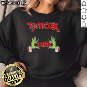 Premium TJ Maxx X Grinch Hands Merry Christmas Sweatshirt featuring festive design and cozy fit for holiday cheer.