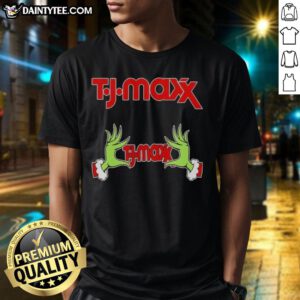 Premium Tj Maxx X Grinch Hands Merry Christmas T-Shirt featuring festive design and vibrant colors for holiday cheer.
