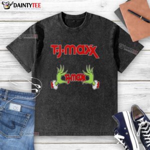 Alt Text: Premium TJ Maxx X Grinch Hands Merry Christmas washed t-shirt featuring festive design and vibrant colors.