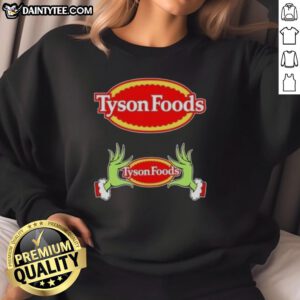 Premium Tyson Foods X Grinch Hands Merry Christmas Sweatshirt featuring festive design and cozy fit for holiday cheer.