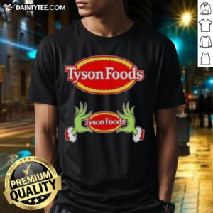 Premium Tyson Foods X Grinch Hands Merry Christmas T-Shirt featuring festive design for holiday celebrations.