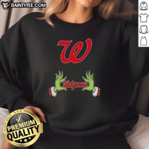 Premium Walgreens X Grinch Hands Merry Christmas Sweatshirt featuring festive design and cozy fit for holiday cheer.