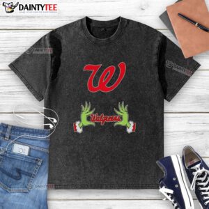 Premium Walgreens X Grinch Hands Merry Christmas washed t-shirt, featuring festive design perfect for holiday celebrations.