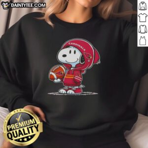 Snoopy in a hoodie, smiling at fans while wearing an Arizona Cardinals sweatshirt - Awesome Peanuts design.