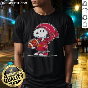 Alt Text: Snoopy in a hoodie supporting Arizona Cardinals, smiling at fans on an Awesome Peanuts T-shirt.
