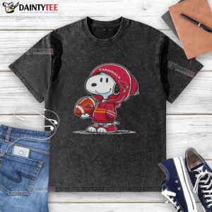 Snoopy in a hoodie smiles at fans, showcasing an Awesome Peanuts Arizona Cardinals washed t-shirt design.