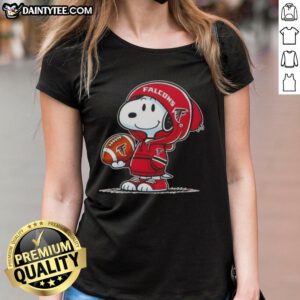 Alt Text: Snoopy in a hoodie smiles at fans, showcasing Atlanta Falcons spirit on an awesome ladies tee.