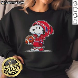 Alt Text: Happy Peanuts Snoopy wearing a Houston Texans hoodie, smiling at fans while showcasing his stylish sweatshirt.