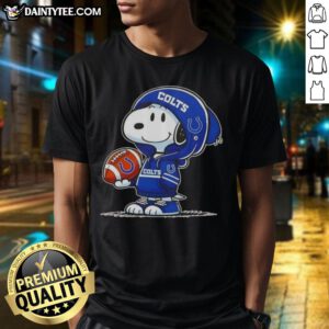 Alt Text: Happy Peanuts Snoopy in a hoodie, smiling at fans on an Indianapolis Colts T-shirt, perfect for NFL enthusiasts.