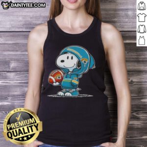 Alt Text: Happy Peanuts Snoopy in a Jacksonville Jaguars hoodie smiles at fans while wearing a tank top, showcasing team spirit.