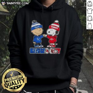 Awesome Charlie Brown fist bump with Snoopy in a Kansas City sports hoodie for Royals and Chiefs fans.