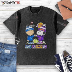 Awesome Charlie Brown fist bump with Snoopy, featuring Los Angeles skyline and Dodgers & Lakers sports theme on washed t-shirt.