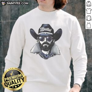 Awesome Dallas Cowboys mascot wearing a beanie and sunglasses, sporting a stylish sweatshirt at a game.