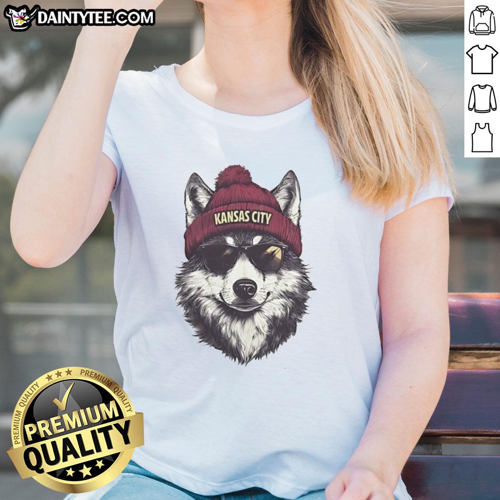 Kansas City Chiefs mascot in a beanie and sunglasses on a ladies tee, showcasing team spirit and style.
