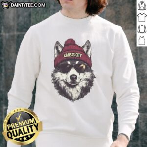 Alt Text: Kansas City Chiefs mascot in beanie and sunglasses wearing a sweatshirt, showcasing team spirit and fun.